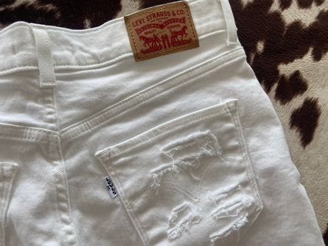 Pre-Loved Levi's Distressed White Denim Shorts Size 28 - Deer Creek Mercantile