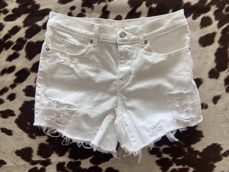 Pre-Loved Levi's Distressed White Denim Shorts Size 28 - Deer Creek Mercantile